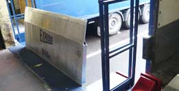 Electrified stationary drawbridge leveler with anti-squash monobloc frame