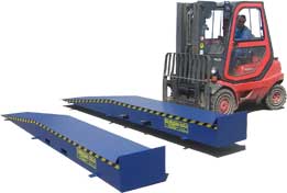 Steel wheel riser with forklift pockets