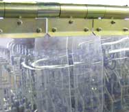 Flexible door with PVC strip curtains - Model PTLT2 - Articulated oscillating support